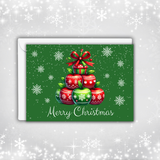 ChatGPT said:  🎄 Merry Christmas Apple Stack Greeting Card – 7x5 Holiday Card with Envelopes | Teacher Christmas Card | Festive Green & Red Ornament Design